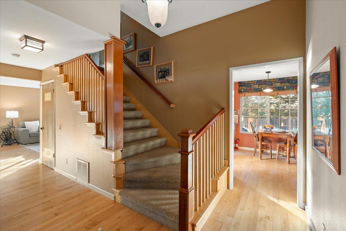 16715 Trail Drive Morgan Hill, CA 95037 - Photo 10 of 45 a view of a hallway view with wooden floor and staircase