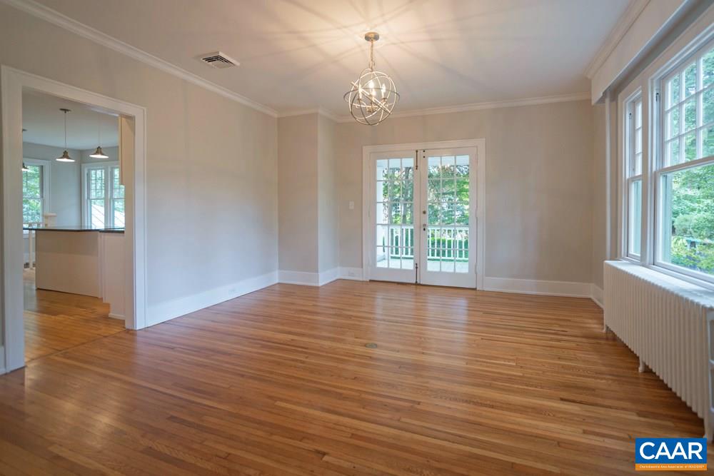 1930 Thomson Road Charlottesville, VA 22903 - Photo 12 of 35 an empty room with wooden floor and windows