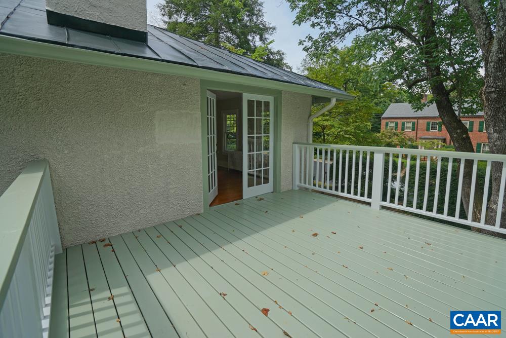 1930 Thomson Road Charlottesville, VA 22903 - Photo 21 of 35 a view of backyard with deck and wooden floor