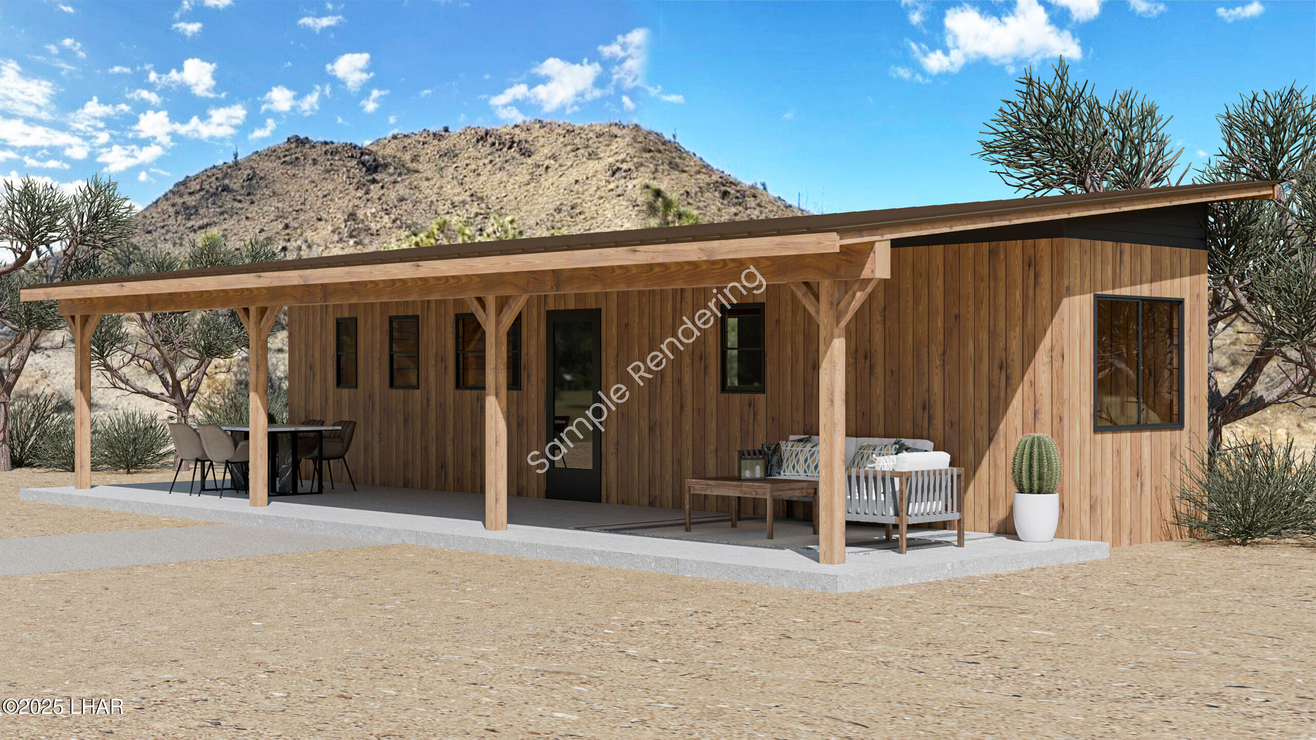 Lot 65 South Cameron Road Yucca, AZ 86438 - Photo 15 of 22 a view of a patio with table and chairs and wooden fence