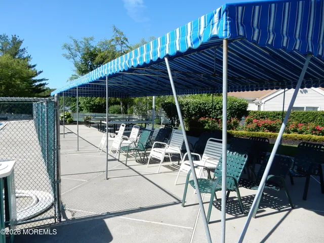 a view of pool with tree s