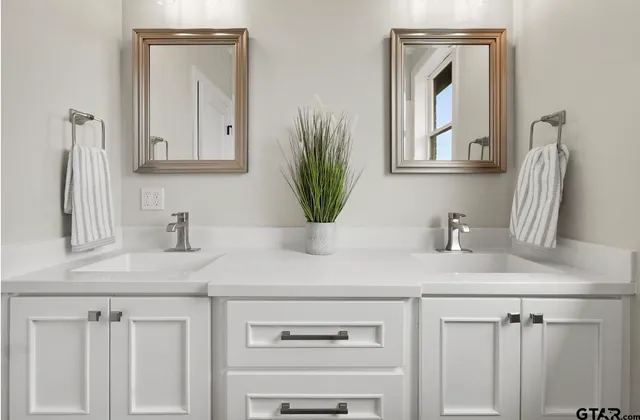 a bathroom with a bathtub and a toilet