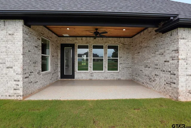 a house with garden in front of it