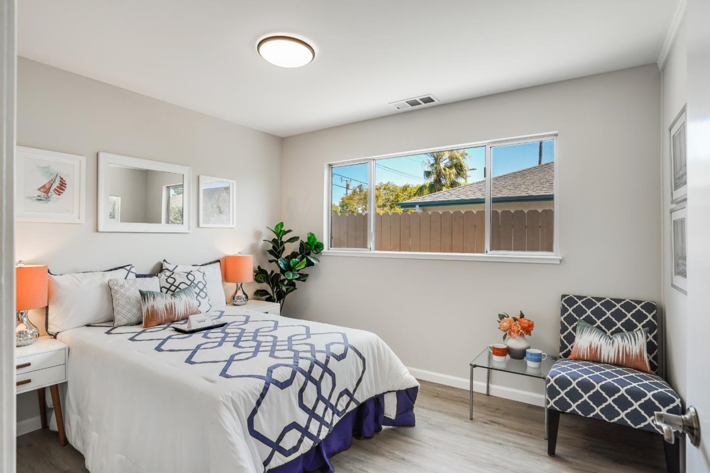 508 Mountain View Avenue Belmont, CA 94002 - Photo 16 of 38 a bedroom with bed and wooden floor