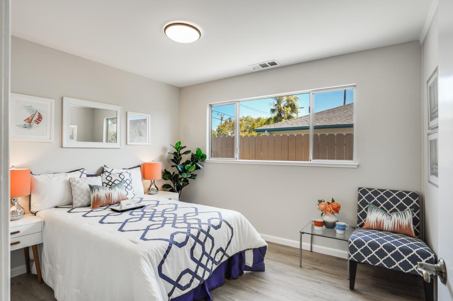 508 Mountain View Avenue Belmont, CA 94002 - Photo 22 of 38 a bedroom with bed and wooden floor