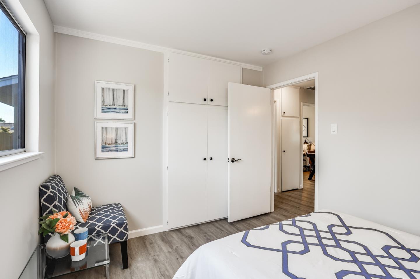 508 Mountain View Avenue Belmont, CA 94002 - Photo 23 of 38 a bedroom with a bed and wooden floor