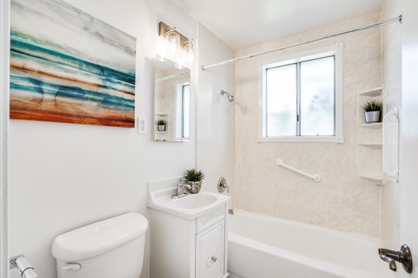 508 Mountain View Avenue Belmont, CA 94002 - Photo 24 of 38 a white toilet sitting next to a bath tub