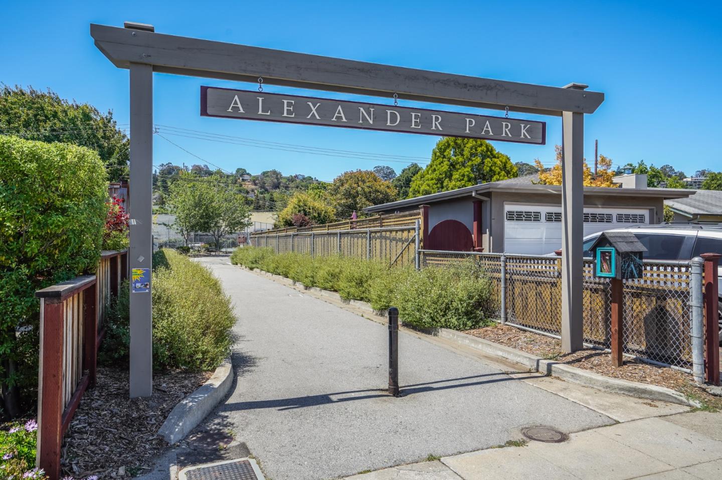 508 Mountain View Avenue Belmont, CA 94002 - Photo 34 of 38 a front view of a house with a yard and potted plants