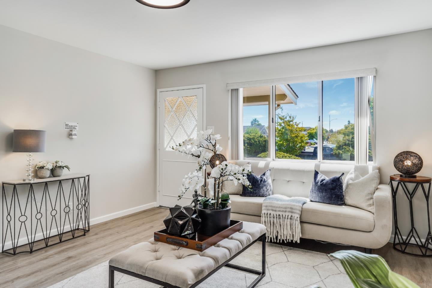 508 Mountain View Avenue Belmont, CA 94002 - Photo 6 of 38 a living room with furniture and a large window