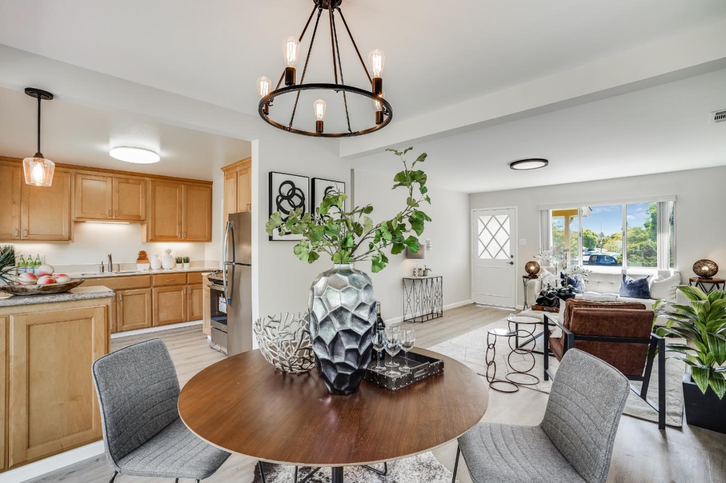508 Mountain View Avenue Belmont, CA 94002 - Photo 7 of 38 a living room with furniture chandelier and a table