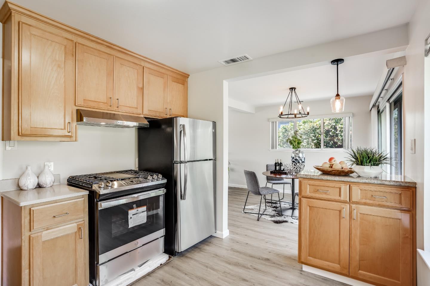 508 Mountain View Avenue Belmont, CA 94002 - Photo 10 of 38 a kitchen with white cabinets and appliances