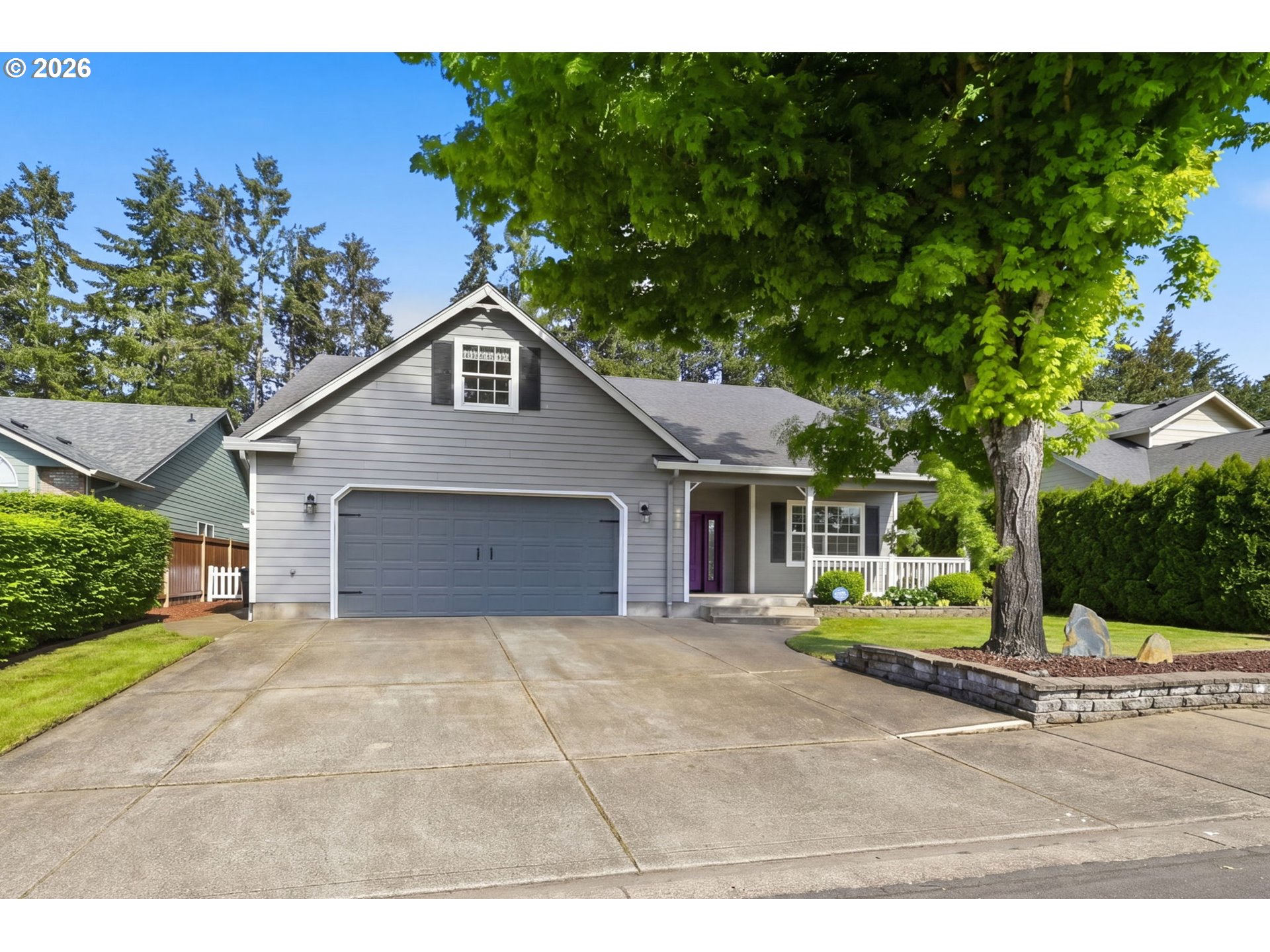 667 72nd Street Springfield, OR 97478 - Photo 1 of 40 a front view of a house with a yard and potted plants
