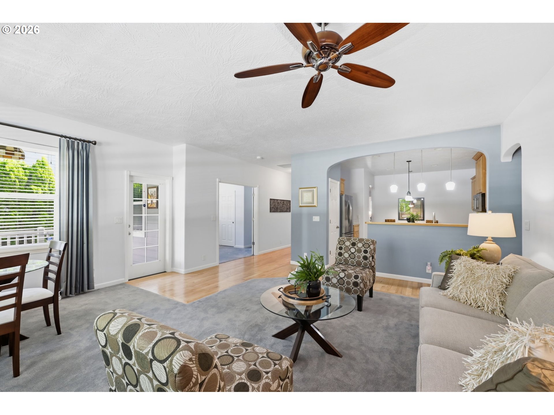 667 72nd Street Springfield, OR 97478 - Photo 11 of 40 a living room with furniture and a chandelier