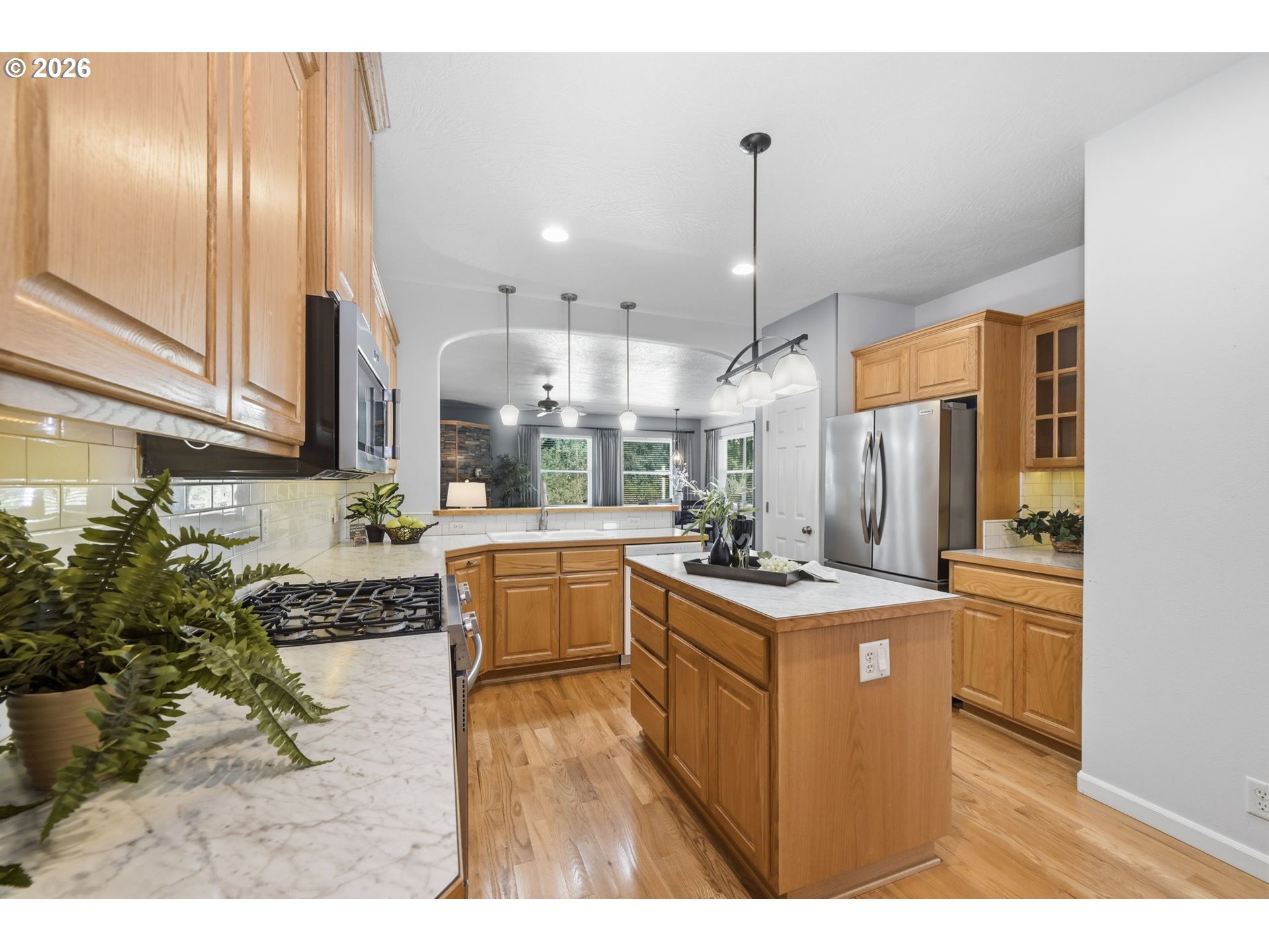 667 72nd Street Springfield, OR 97478 - Photo 14 of 40 a kitchen with a stove a refrigerator and a sink