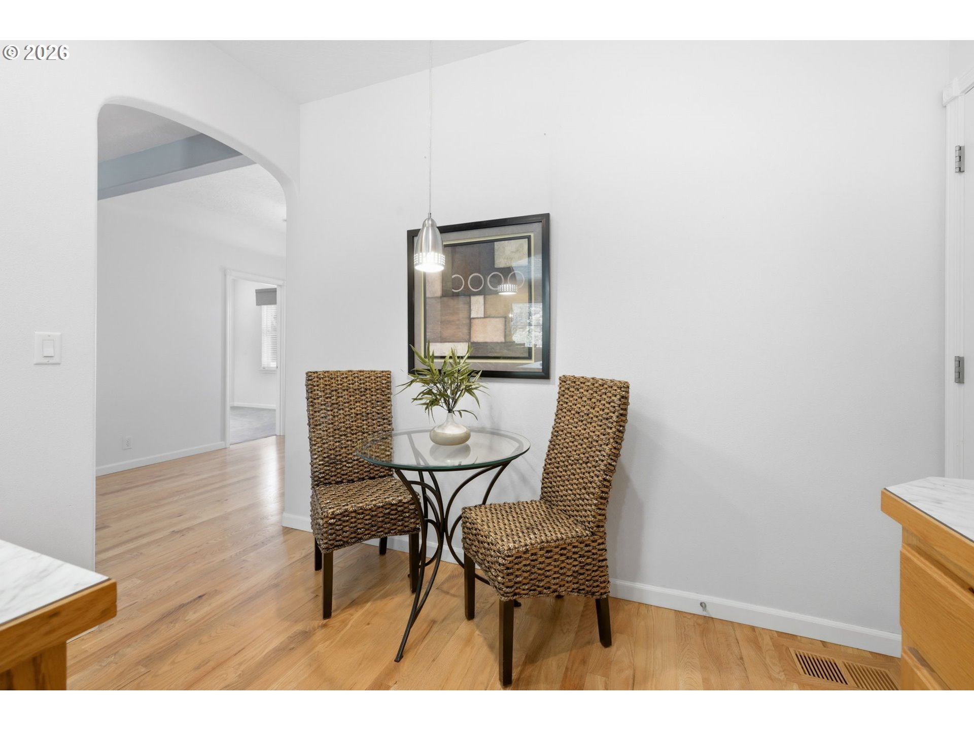 667 72nd Street Springfield, OR 97478 - Photo 17 of 40 a view of a dining room with furniture and wooden floor