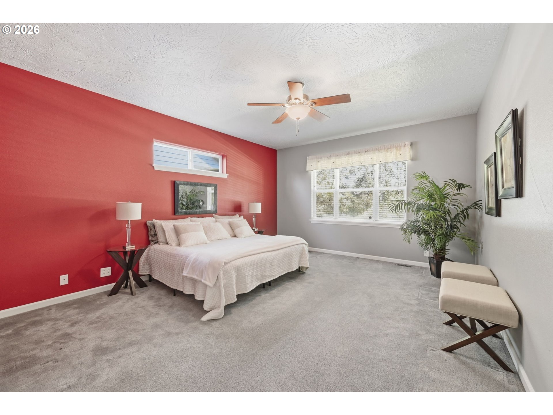 667 72nd Street Springfield, OR 97478 - Photo 18 of 40 a bedroom with a large bed and a chandelier