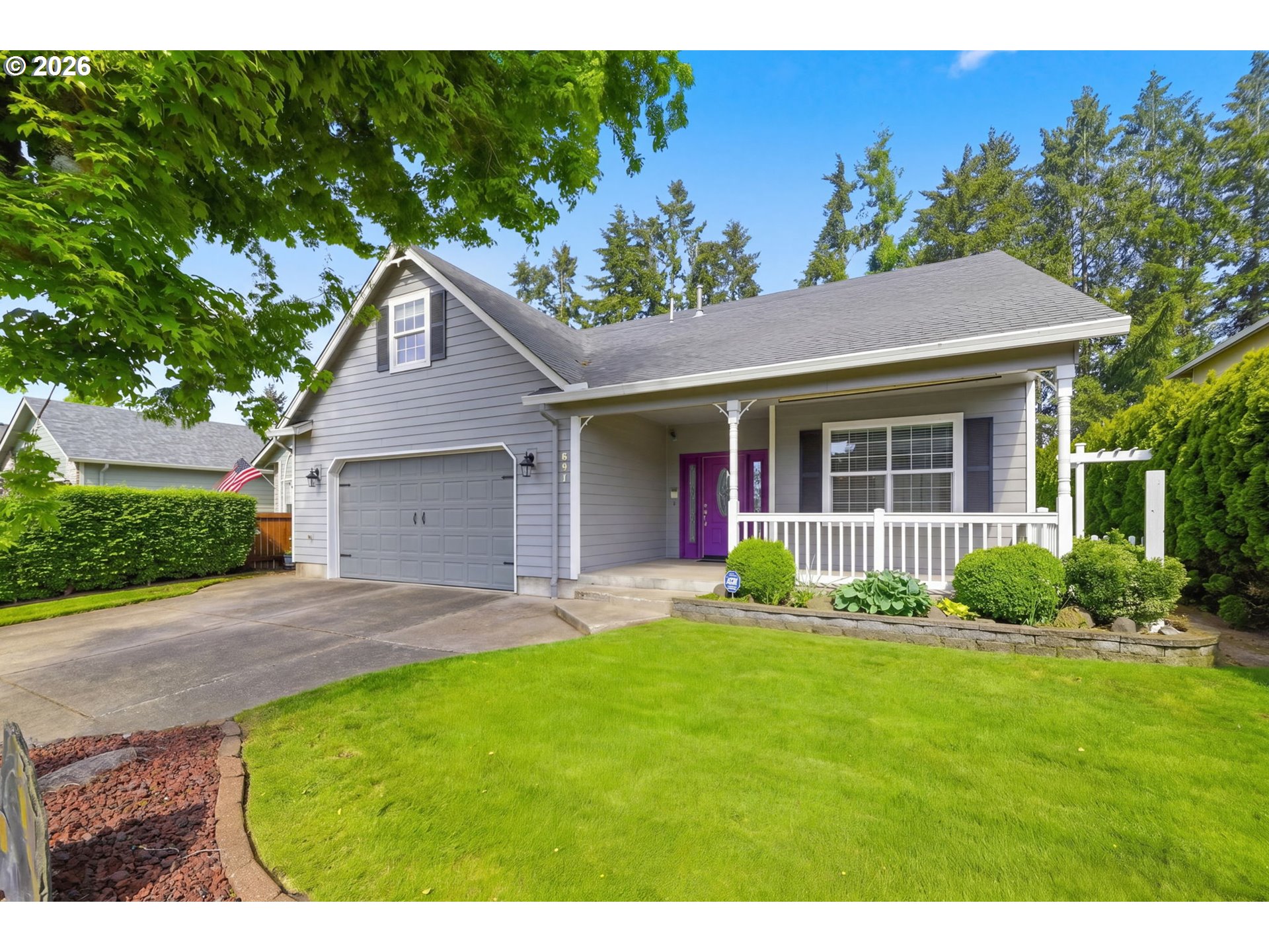 667 72nd Street Springfield, OR 97478 - Photo 2 of 40 a view of a house with a yard and potted plants