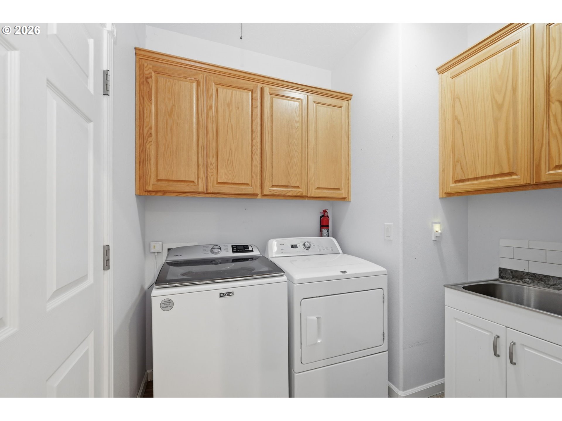 667 72nd Street Springfield, OR 97478 - Photo 31 of 40 a utility room with dryer and washer