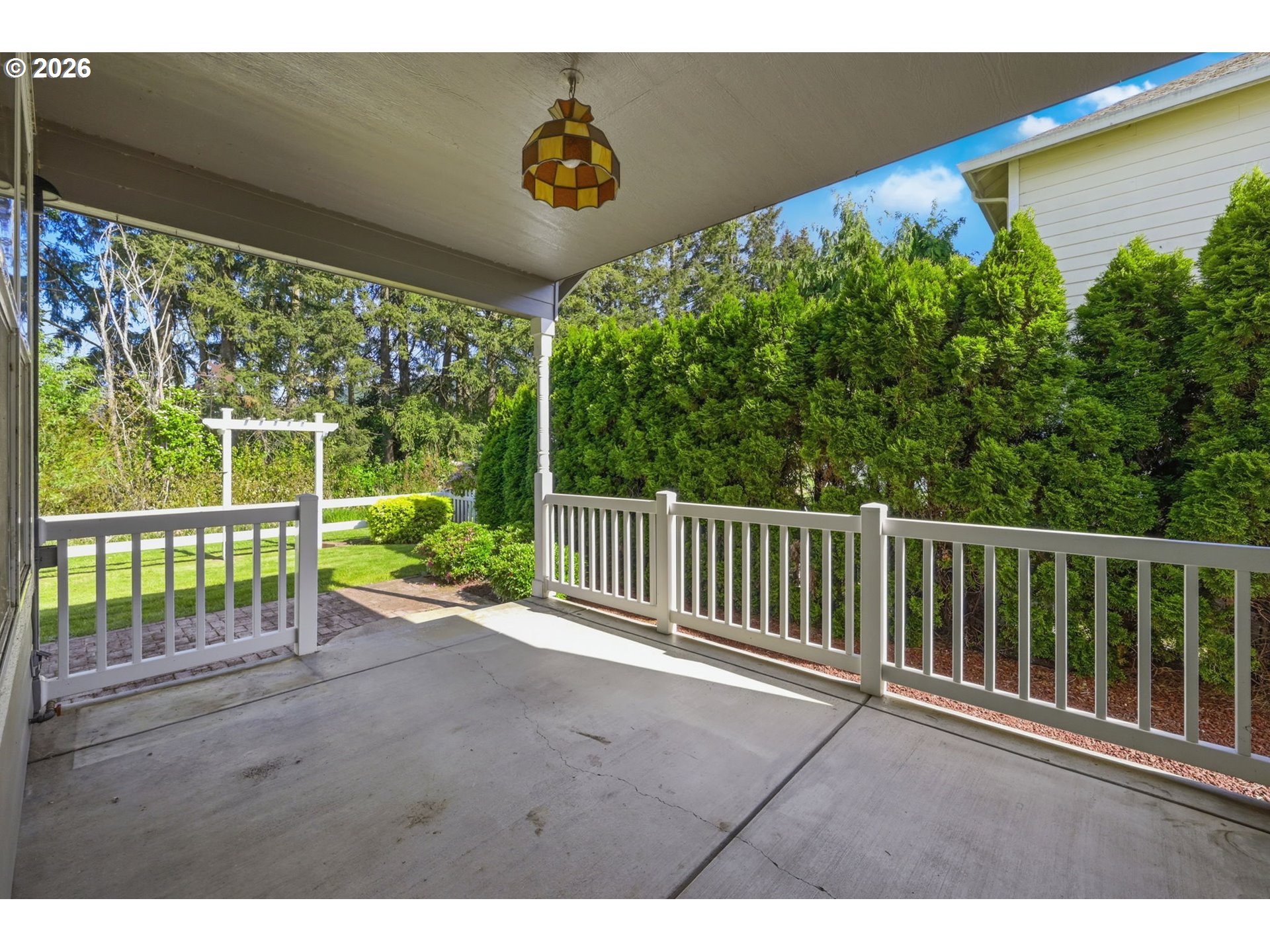 667 72nd Street Springfield, OR 97478 - Photo 33 of 40 a view of backyard with trees