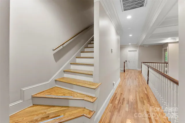 a view of entryway with wooden floor