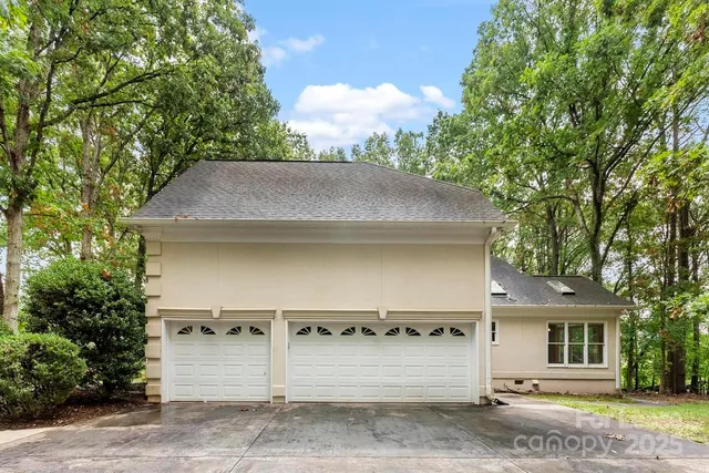 a house with a tree in front of it