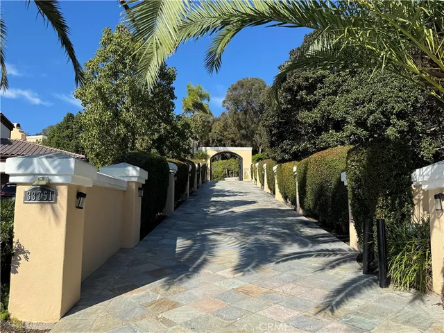 a view of a chairs and table in the patio