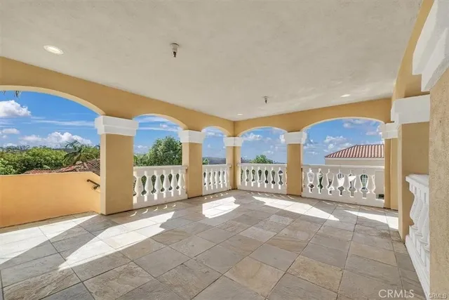an aerial view of a house with a balcony
