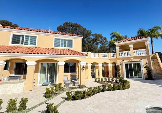 a house view with a garden space