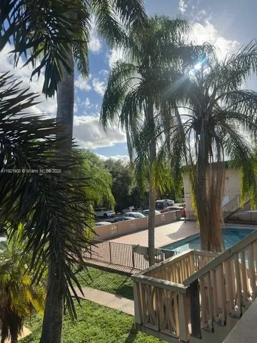 a view of a yard with plants