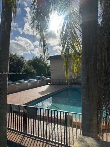 a view of a yard and a patio
