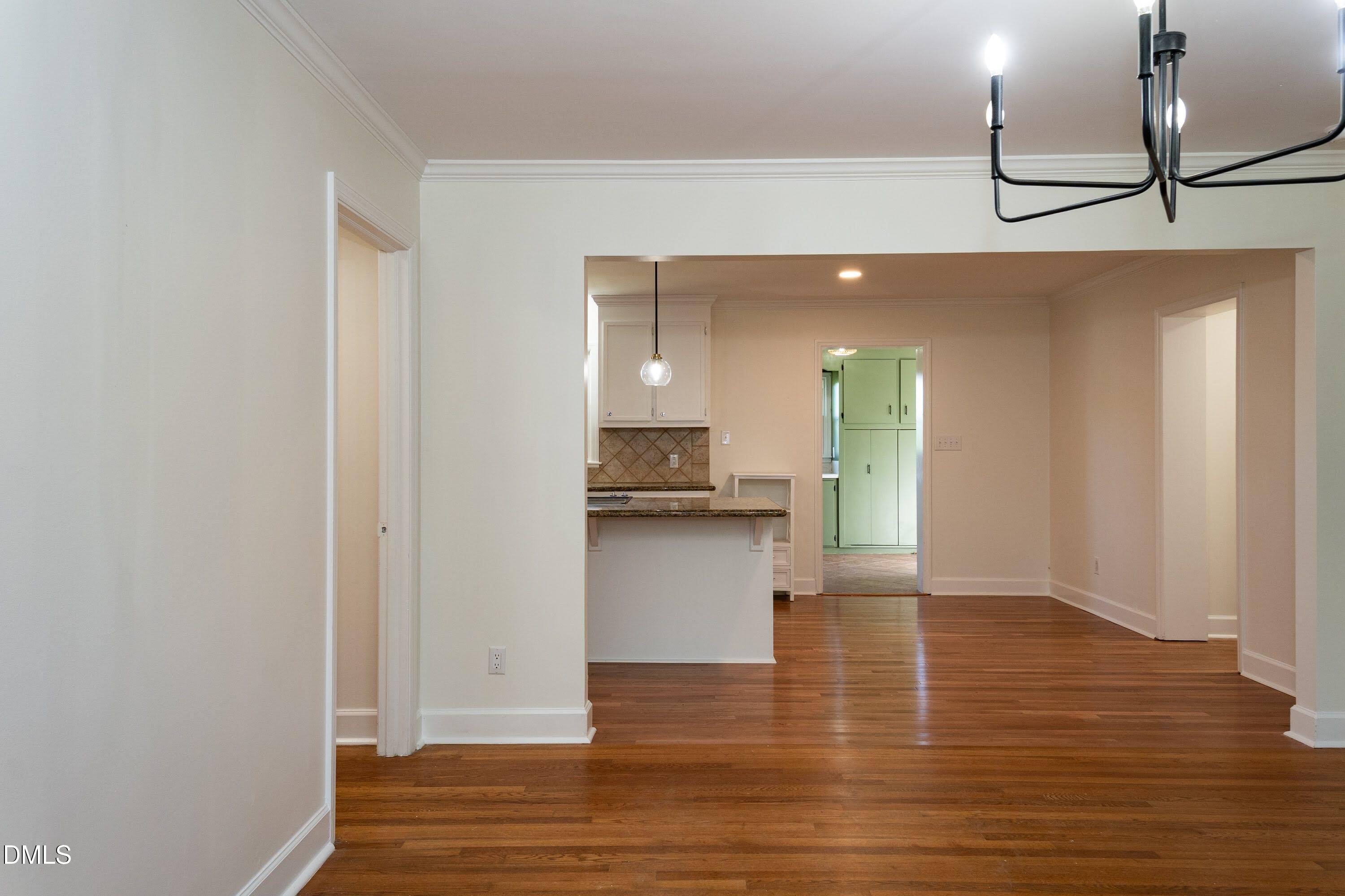 641 Rocky Ford Road Louisburg, NC 27549 - Photo 13 of 38 a view of a kitchen and an empty room
