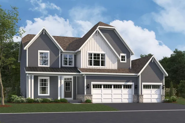 a view of a big house with a yard and large trees