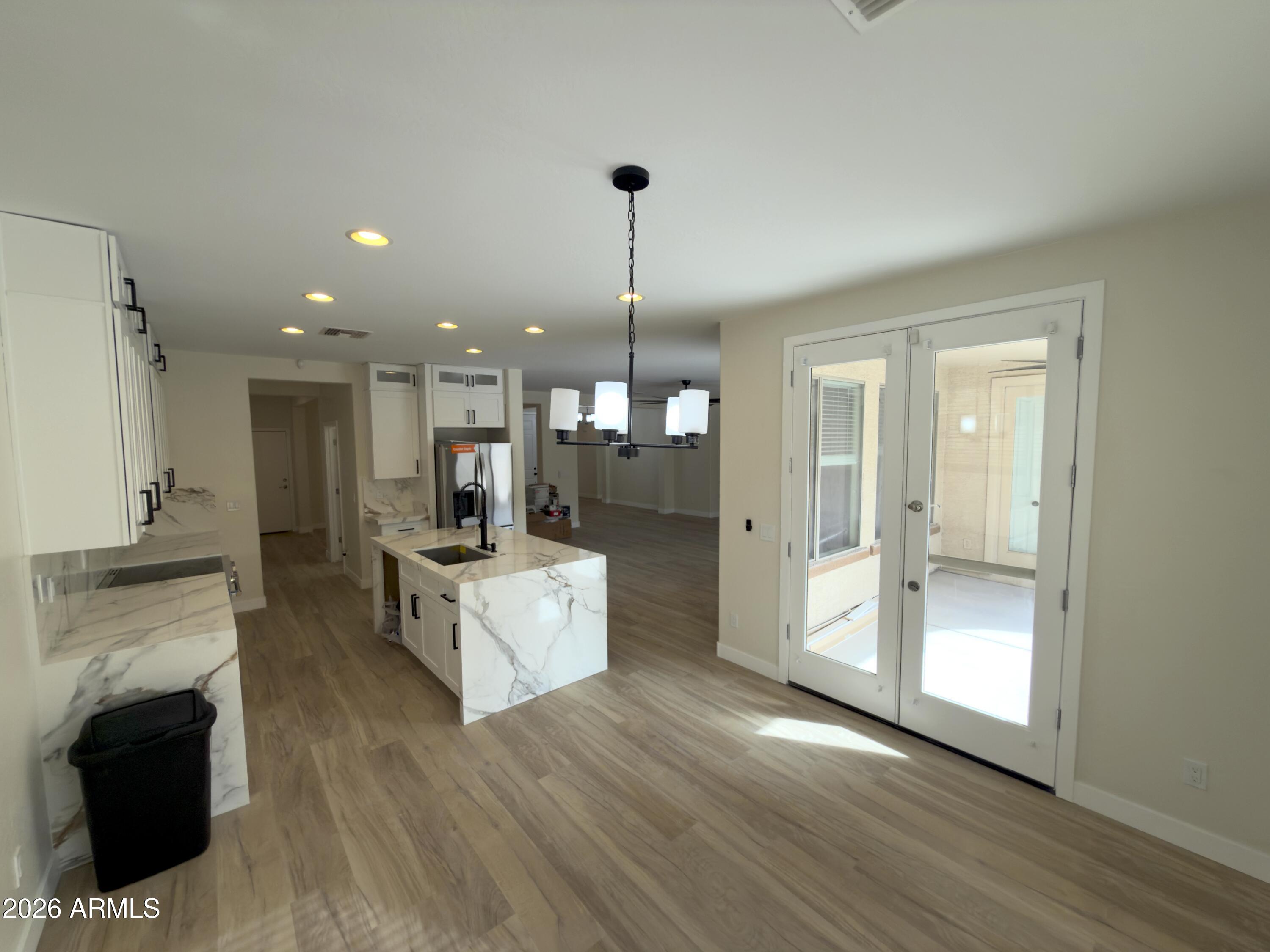 5319 West Coles Road Laveen, AZ 85339 - Photo 6 of 20 a large white kitchen with a large window