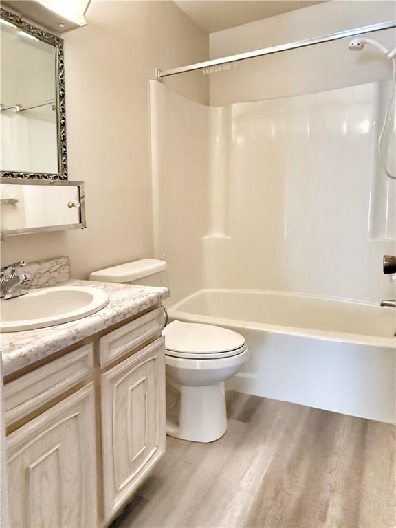 1600 Ohio Avenue, Unit 4 Industry, PA 15052 - Photo 18 of 20 a bathroom with a granite countertop sink a toilet and shower
