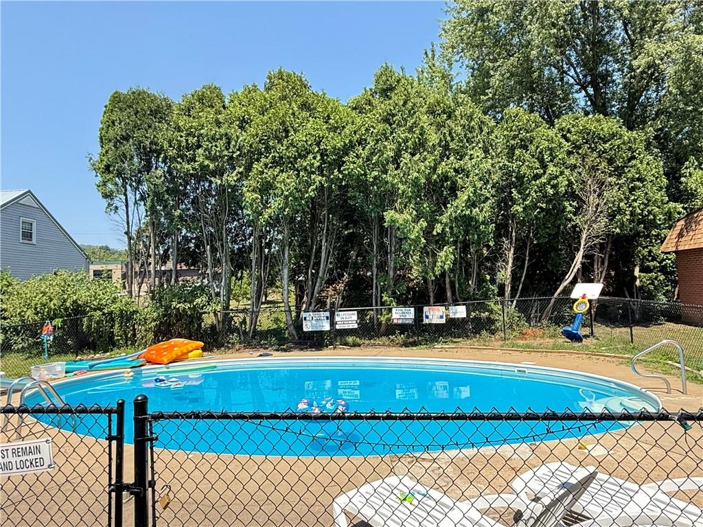 1600 Ohio Avenue, Unit 4 Industry, PA 15052 - Photo 9 of 20 a view of a backyard with swimming pool