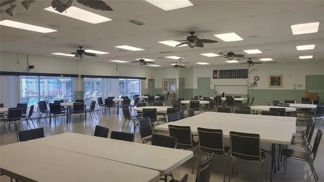 a room with furniture pool table and table soccer