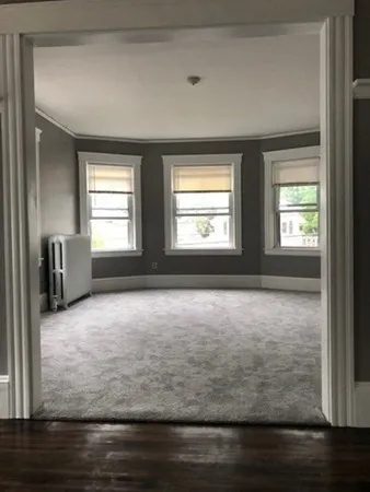 a view of an empty room with window