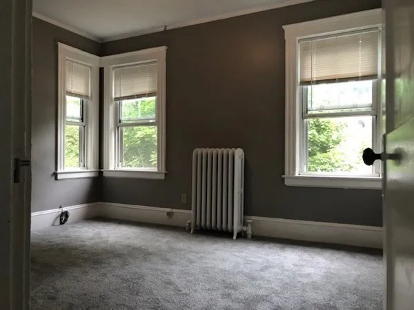 an empty room with windows