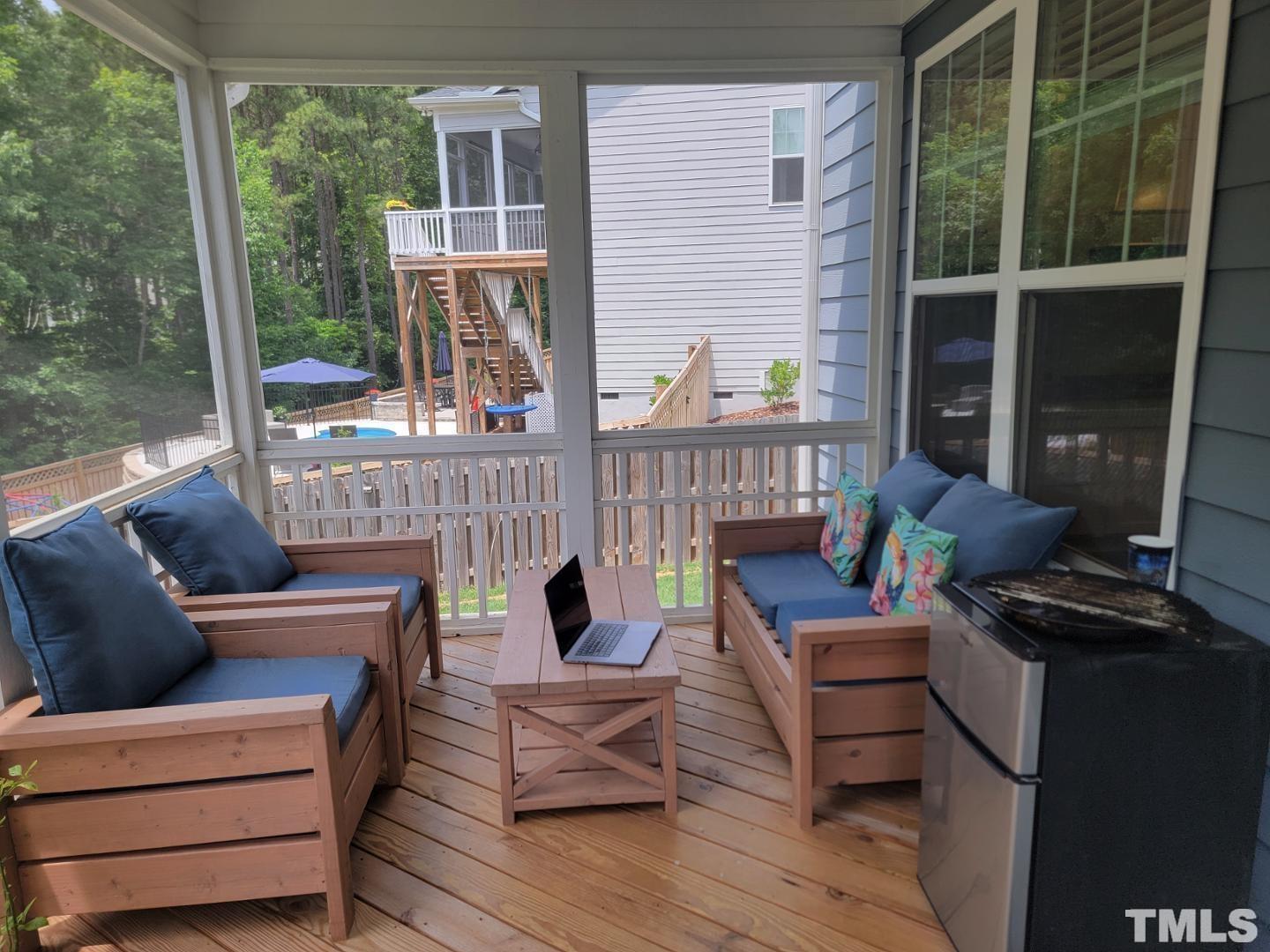 105 Winding Creek Loop Chapel Hill, NC 27517 - Photo 17 of 47 a outdoor living space with patio furniture and garden view