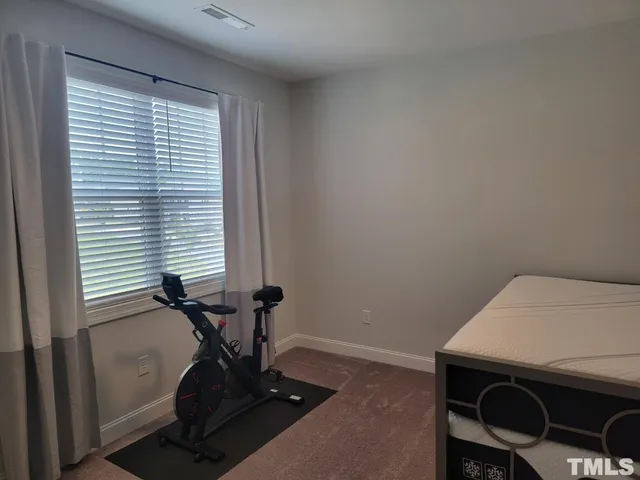 a room with furniture and windows