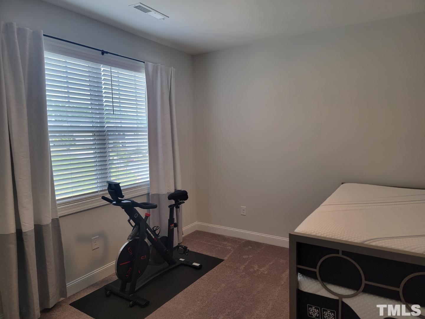 105 Winding Creek Loop Chapel Hill, NC 27517 - Photo 20 of 47 a room with furniture and windows