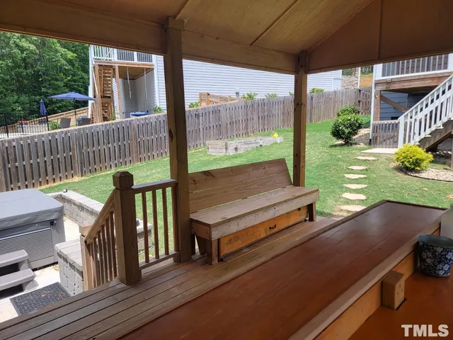 a view of a two chairs in the roof deck