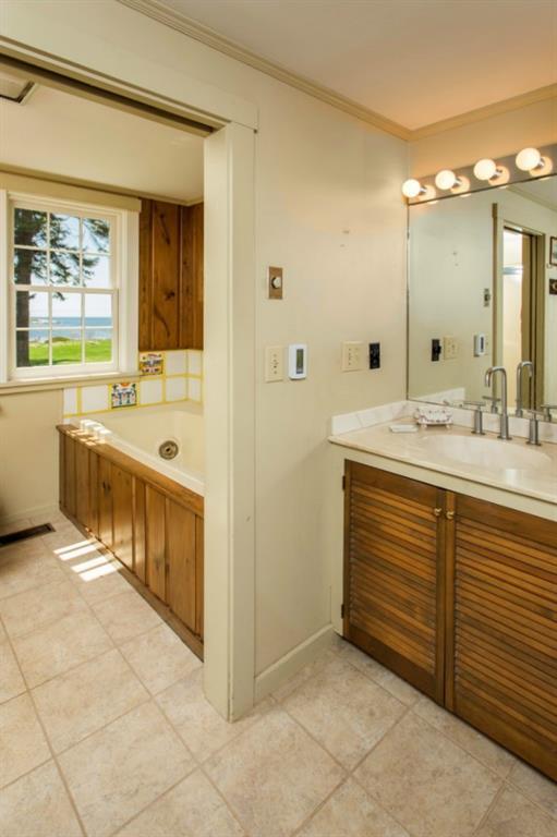 11 Salt Pond Road Southport, ME 04576 - Photo 29 of 33 The master bathroom, with two marble...