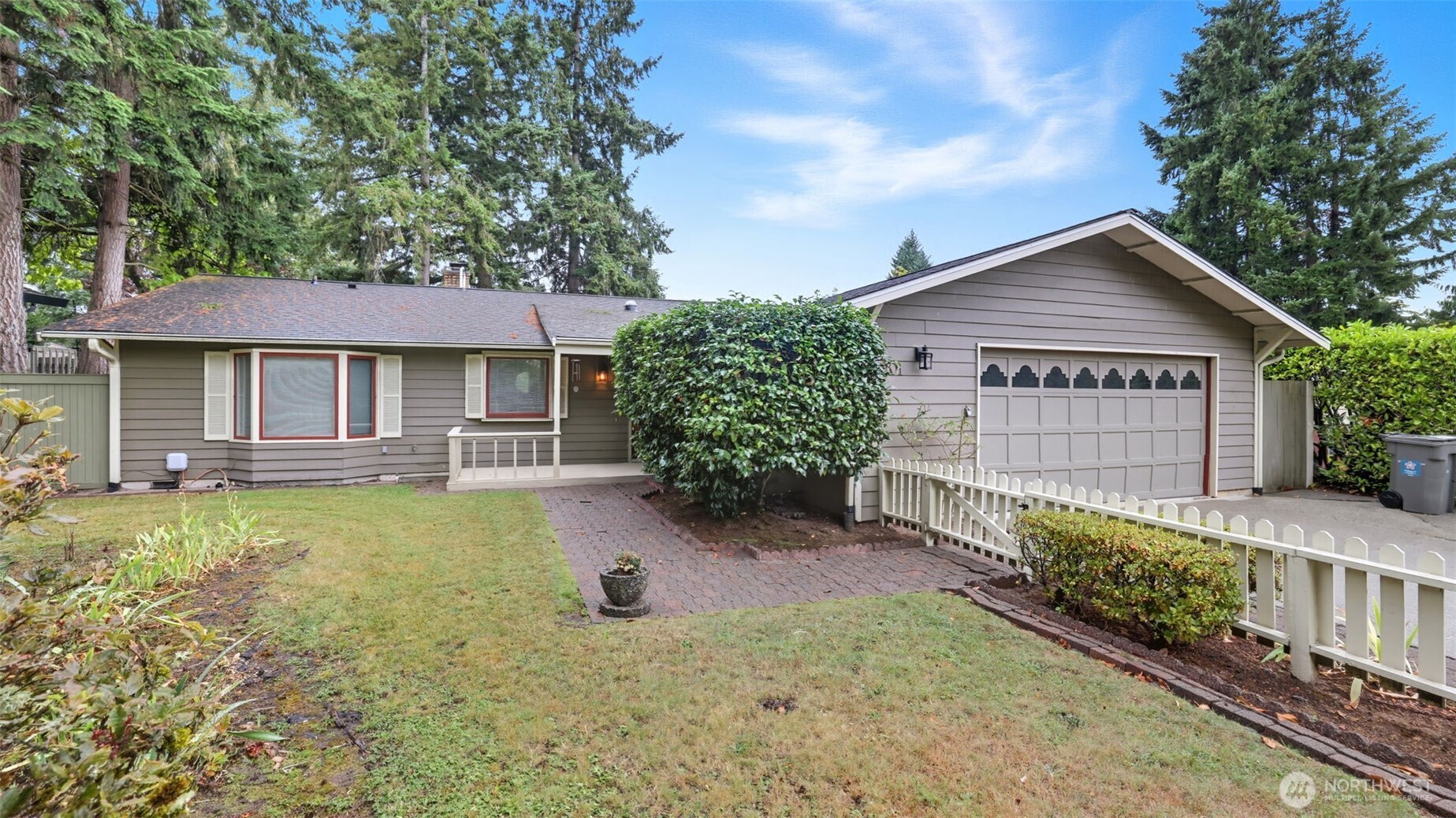 2001 Camas Court Southeast Renton, WA 98055 - Photo 1 of 29 a front view of a house with a yard