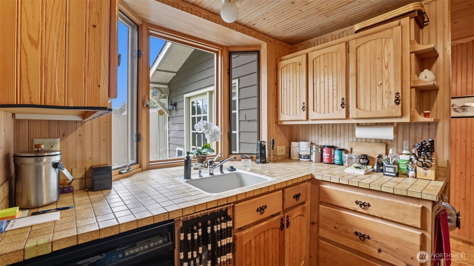 2001 Camas Court Southeast Renton, WA 98055 - Photo 14 of 29 a kitchen with stainless steel appliances granite countertop a sink stove and cabinets