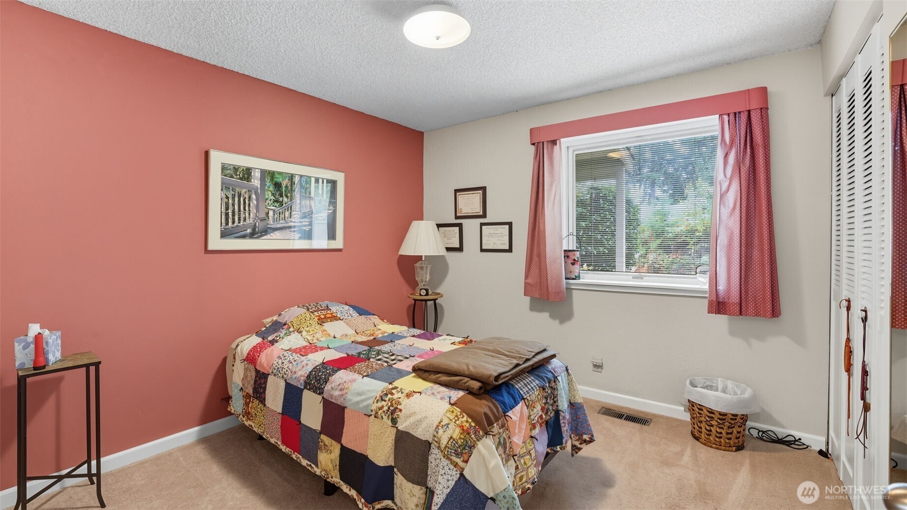2001 Camas Court Southeast Renton, WA 98055 - Photo 22 of 29 a bedroom with a bed and a window