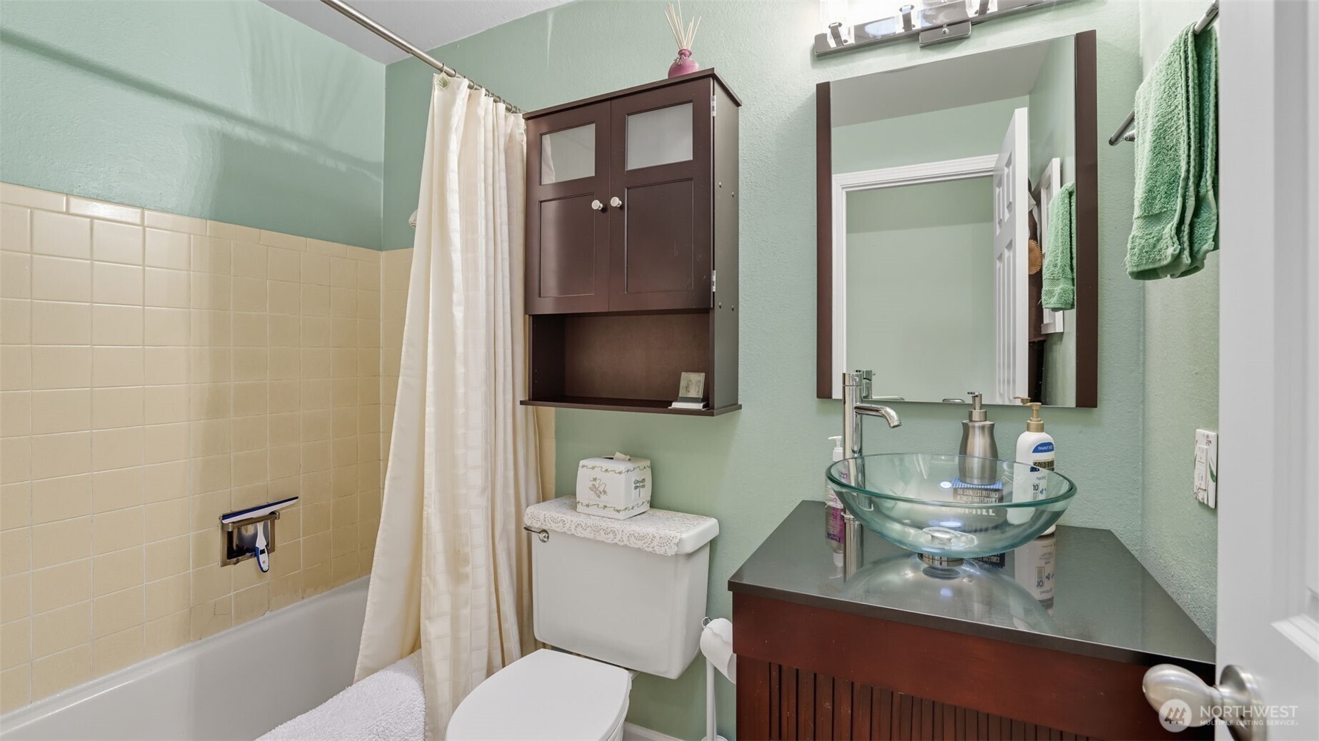 2001 Camas Court Southeast Renton, WA 98055 - Photo 23 of 29 a bathroom with a toilet a sink and mirror
