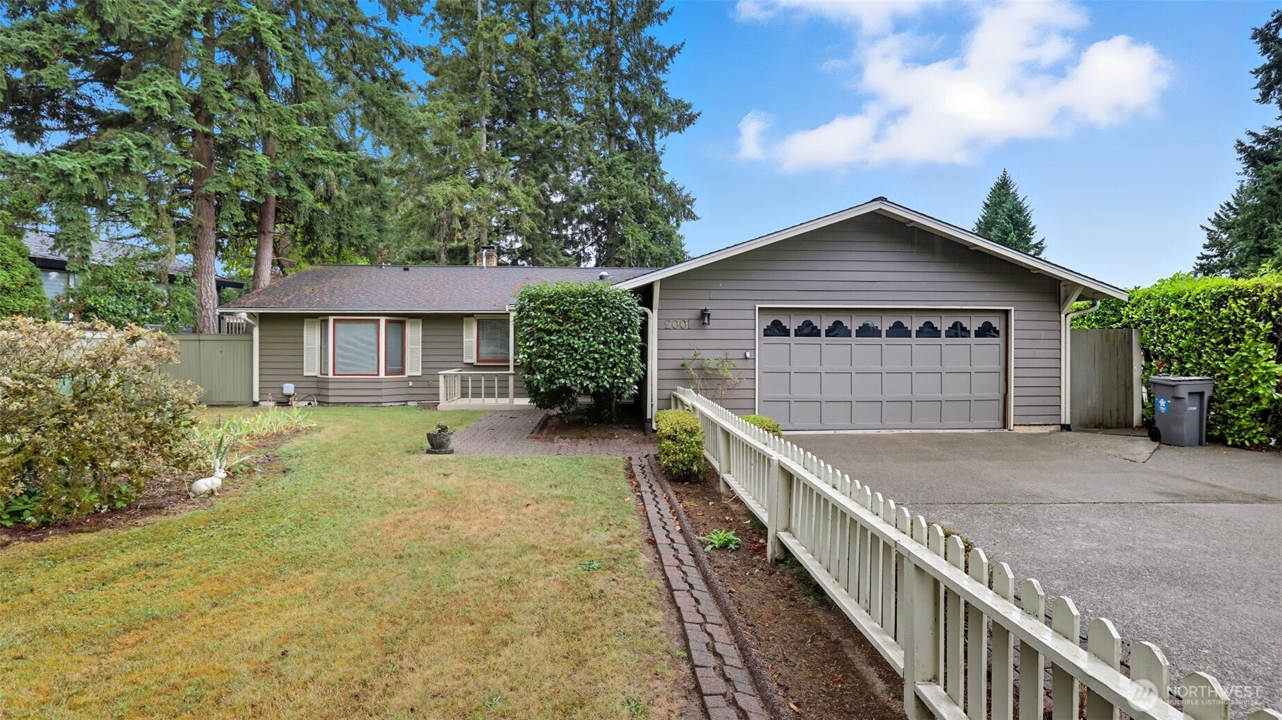 2001 Camas Court Southeast Renton, WA 98055 - Photo 28 of 29 a front view of a house with yard and trees