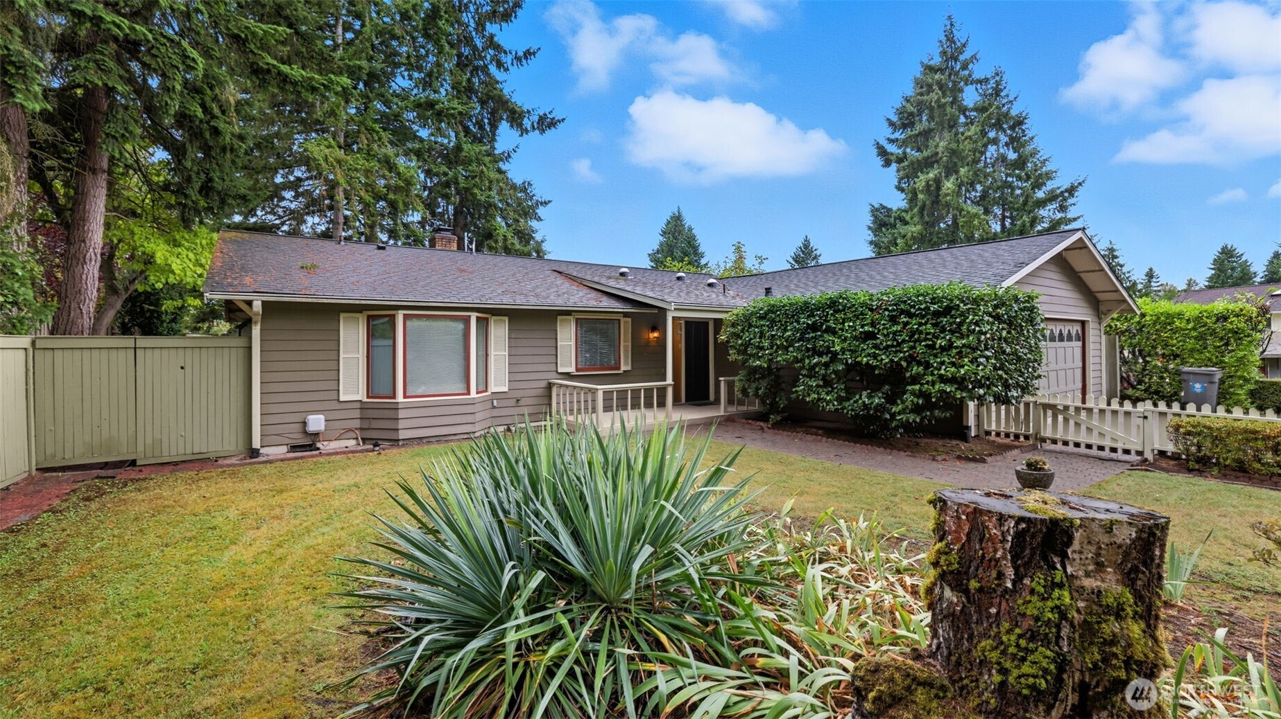 2001 Camas Court Southeast Renton, WA 98055 - Photo 29 of 29 a front view of a house with garden