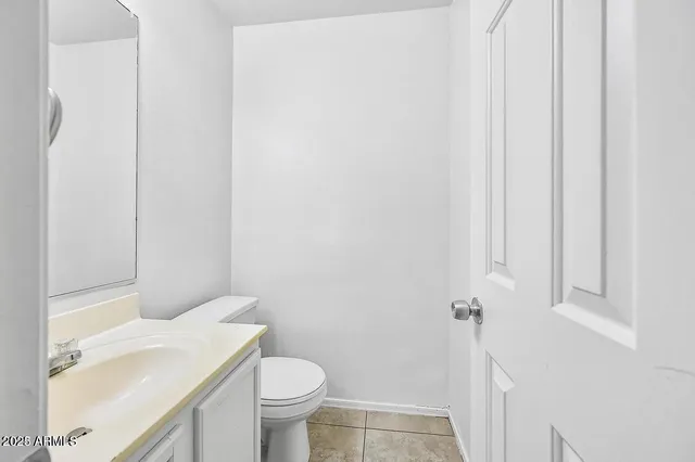 a bathroom with a sink and toilet